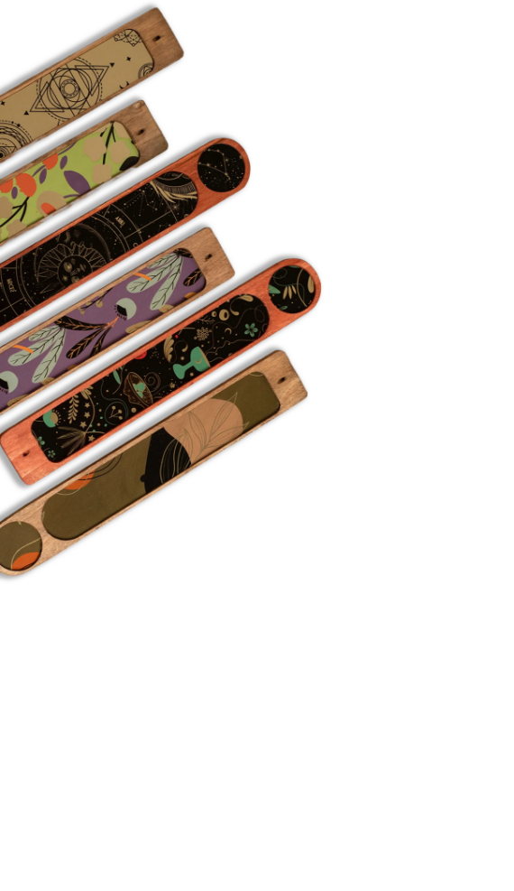 Handcrafted incense holders with decorative motifs arranged diagonally.